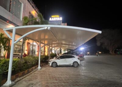 Tensile parking structure with fabric roof at Aariyas Hotel entrance area