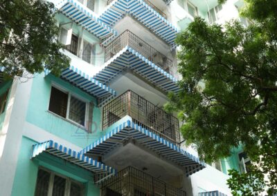 Durable aluminium awnings installation for windows and outdoor shade by Amudha Decors