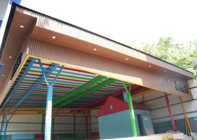 PUF roofing installation for school auditorium by Amudha Decors – durable and insulated roofing solution