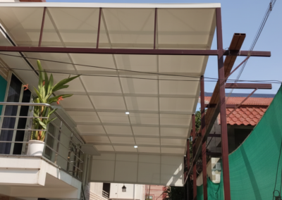 Industrial canopy roofing installation at BBK Leathers in Ranipet by Amudha Decors