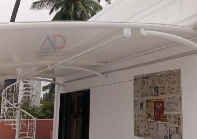 White tensile canopy installed for home entrance by Amudha Decors