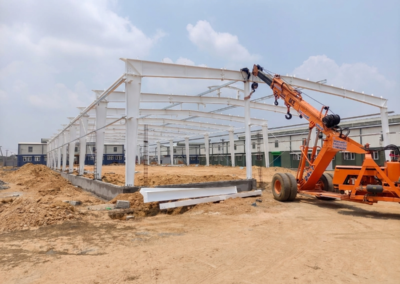 PEB structure installation by Amudha Decors with steel frame construction for industrial warehouse building in Kancheepuram
