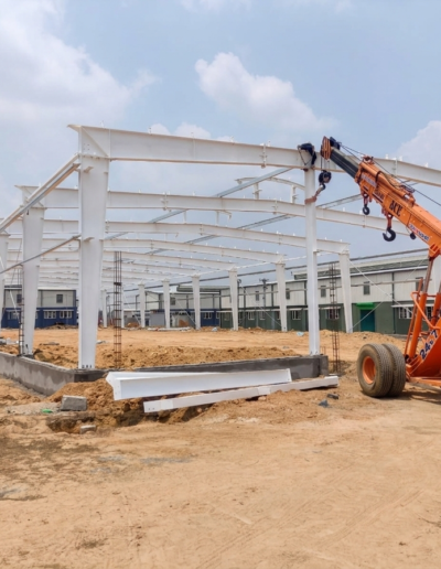 PEB structure installation by Amudha Decors with steel frame construction for industrial warehouse building in Kancheepuram