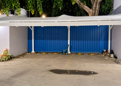 White tensile car parking canopy installation for residential parking