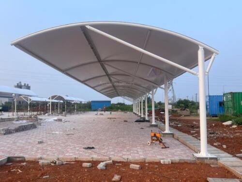 Modern tensile structure with fabric canopy, offering innovative and durable design for outdoor spaces.
